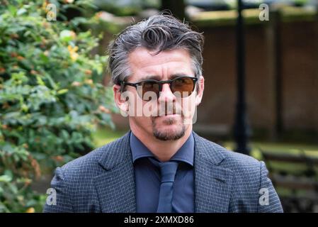 Joey Barton arrive au Warrington Combined Crown and Magistrates court Centre où il est accusé d'infraction de communication malveillante. L'accusation concerne des tweets qu'il a envoyés concernant Eni Aluko, spécialiste du football à la télévision, lors d'un match de la FA Cup qu'elle commentait pour la BBC en janvier. Date de la photo : mardi 30 juillet 2024. Banque D'Images