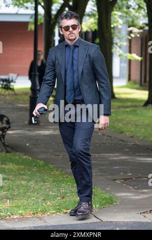 Joey Barton arrive au Warrington Combined Crown and Magistrates court Centre où il est accusé d'infraction de communication malveillante. L'accusation concerne des tweets qu'il a envoyés concernant Eni Aluko, spécialiste du football à la télévision, lors d'un match de la FA Cup qu'elle commentait pour la BBC en janvier. Date de la photo : mardi 30 juillet 2024. Banque D'Images