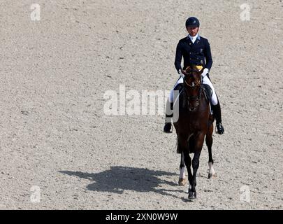 Versailles, France. 30 juillet 2024. Patrik Kittel de Suède, Riding Touchdown, concourt lors du grand prix de dressage jour 1 de l'équitation aux Jeux Olympiques de Paris 2024 à Versailles, France, le 30 juillet 2024. Crédit : Li Ying/Xinhua/Alamy Live News Banque D'Images