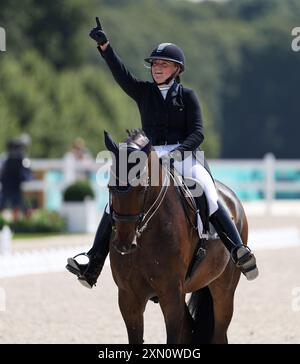 Versailles, France. 30 juillet 2024. Justina Vanagaite, de Lituanie, à cheval sur Nabab, participe au grand prix de dressage jour 1 de l'équitation aux Jeux Olympiques de Paris 2024 à Versailles, France, le 30 juillet 2024. Crédit : Li Ying/Xinhua/Alamy Live News Banque D'Images