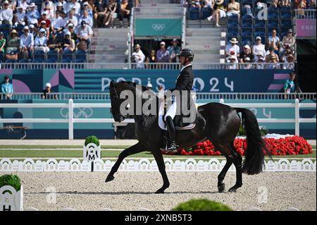 Paris, Fra. 31 juillet 2024. Le belge Domien Michiels chevauche Intermezzo VH Meerdaalhof lors de la compétition de dressage équestre, aux Jeux olympiques d'été de Paris 2024, le 31 juillet 2024, à Versailles. (Photo par Anthony Behar/Sipa USA) crédit : Sipa USA/Alamy Live News Banque D'Images