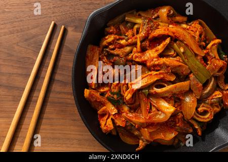 Estomac de porc sauté avec assaisonnement épicé Banque D'Images