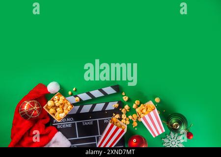 Partie de nuit de film de Noël, rassemblez des amis et la famille pour le home cinéma. Invitations au nouvel an, première du film de Noël avec clapperboard, Noël Banque D'Images