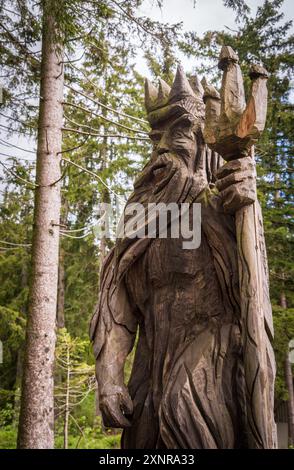 Une sculpture en bois Mummelsee au Mummelseegeist Black Forest Allemagne Banque D'Images