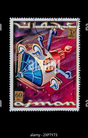 Exploration spatiale timbres postaux d'Ajman 1971. Conception futuriste de ce à quoi un vaisseau spatial pourrait ressembler. Banque D'Images