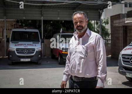 Jénine, Palestine. 17 juillet 2024. Mahmoud Alsadi, directeur de la Société du Croissant-Rouge palestinien à Djénine. En juillet, la Cour internationale de Justice de la Haye a rendu un avis consultatif déclarant qu'Israël occupait illégalement la Cisjordanie et Jérusalem-est depuis 57 ans. Crédit : SOPA images Limited/Alamy Live News Banque D'Images