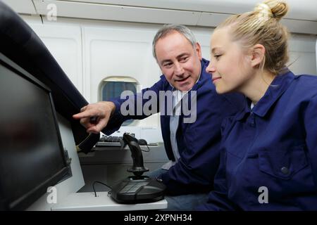 portrait de travailleurs dans le salon d'avion Banque D'Images