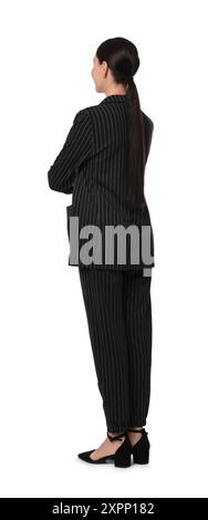 Femme en costume rayé noir sur fond blanc Banque D'Images