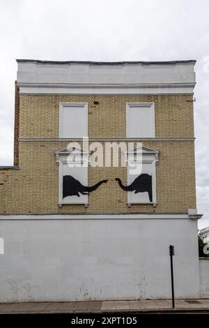 Deux éléphants comme murale de Banksy sur Edith Street, Chelsea Banque D'Images