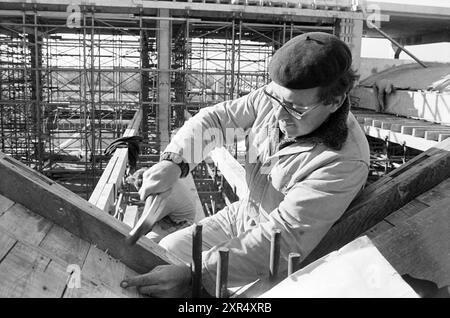 Un bâtiment commercial en construction, Whizgle Dutch News : des images historiques sur mesure pour l'avenir. Explorez le passé néerlandais avec des perspectives modernes grâce à des images d'agences néerlandaises. Concilier les événements d'hier avec les perspectives de demain. Embarquez pour un voyage intemporel avec des histoires qui façonnent notre avenir. Banque D'Images