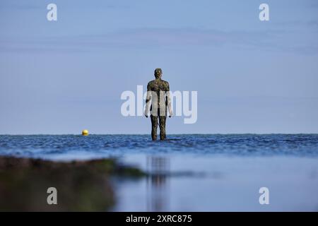 Antony Gormley une autre fois Statue. UNE AUTRE FOIS est une série de cent figures solides en fonte d'Antony Gormley Banque D'Images