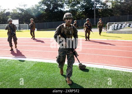 Les Marines américains avec la compagnie B, 9e bataillon de soutien du génie, 3e groupe logistique des Marines, effectuent le chargement dans le point de ralliement objectif et l'entraînement de défense en préparation du programme d'échange des Marines coréens 24,2 sur le camp Mujuk, Corée du Sud, le 26 juillet 2024. Le KMEP est un exercice de formation bilatéral qui accroît l'interopérabilité et renforce les capacités combinées des Marines de la République de Corée et des États-Unis. (Photo du corps des Marines des États-Unis par le caporal Paley Fenner) Banque D'Images