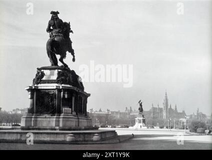 La photographie montre Heldenplatz à Vienne, en Autriche. Heldenplatz, ou « place des héros », est un lieu historique important, en particulier à l'époque nazie. C’est ici, le 15 mars 1938, qu’Adolf Hitler prononça un discours devant une foule massive suite à l’Anschluss, l’annexion de l’Autriche à l’Allemagne nazie. Cet événement a marqué un moment charnière dans l'expansion du troisième Reich et a été fortement mis en avant dans la propagande nazie pour symboliser l'unification de l'Autriche et de l'Allemagne sous la domination nazie. Banque D'Images