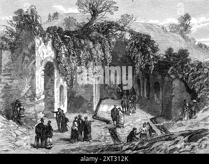 La fontaine d'Egeria, à Rome, 1870. 'Une excursion de la British Archaeological Society of Rome à la soi-disant Fontaine d'Egeria a donné à notre artiste l'occasion de nous envoyer un croquis de cet objet intéressant... la prétendue Fontaine était un nymphée sur le terrain d'Hérode. Il a une exposition nord, et serait frais en été. Il y a le fragment d'une statue de marbre à la fin, et trois becs de marbre par lesquels une source fournit de l'eau. Le bâtiment est meublé avec des tuyaux à travers les murs et un conduit tout autour de ses côtés. Toute cette eau rendrait l'endroit charmant dans le Banque D'Images