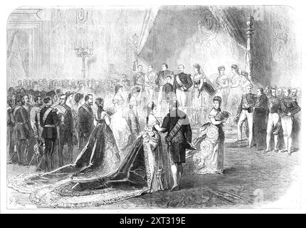 Réception des dames aux Tuileries le jour de l'an 1870. « Le jour de l'année », comme l'appellent les Français, est gardé par toute la société parisienne avec la stricte exécution des devoirs de visite et d'être visité ; de complimenter leur connaissance et de recevoir des compliments. Mais les réceptions cérémonielles à la Cour des Tuileries sont d'une importance suprême. L'Empereur, avec son petit fils à ses côtés, avoue d'abord sa présence dans la salle du tr&#xf4;n les Ambassadeurs des Etats étrangers, dirigés par le Nonce pontifical, pour lui souhaiter "Une bonne année!", suivie de th Banque D'Images