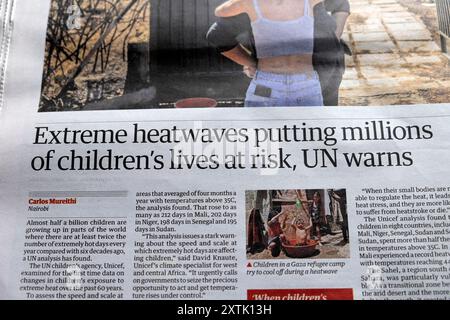 « Des vagues de chaleur extrêmes mettent en danger la vie de millions d'enfants, met en garde l'ONU » le journal Guardian en manchette article sur la crise climatique 14 août 2024 Londres Royaume-Uni Banque D'Images