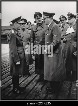 Le dictateur roumain, le maréchal Ion Antonescu (à gauche), s'entretient avec Adolf Hitler lors d'une visite officielle en Allemagne, sous le regard des autorités nazies. La Roumanie du maréchal Ion Antonescu était le deuxième allié le plus important d’Adolf Hitler après l’Italie de Benito Mussolini, représentée au centre par l’interprète d’Hitler, Paul Schmidt. Le deuxième à partir de la droite est Julius Schaub et à l'extrême droite, Joachim von Ribbentrop.1933-1945 Banque D'Images