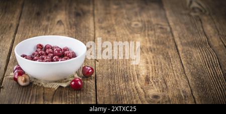 Les cerises confites sur un arrière-plan vintage comme détaillé close-up shot, selective focus Banque D'Images