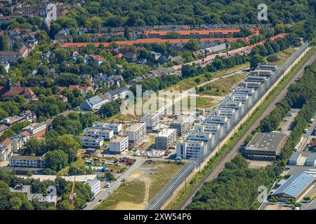 Luftbild, Baustelle Kronprinzenviertel für Neubau von Wohnungen, Hertha-Hoffmann-Straße, Am Wasserturm Südbahnhof, hinten Reihenhaus Mietshäuser Wohnsiedlung mit roten Dächern Düsseldorfer Straße und Im Grubenfeld, Ruhrallee, Dortmund, Ruhrgebiet, Nordrhein-Westfalen, Deutschland ACHTUNGxMINDESTHONORARx60xEURO *** vue aérienne, chantier de construction Kronprinzenviertel pour la nouvelle construction d'appartements, Hertha Hoffmann Straße, Am Wasserturm Südbahnhof, derrière des maisons mitoyennes immeubles d'habitation avec toits rouges Düsseldorfer Straße et Im Grubenfeld, Ruhrallee, Dortmund, Ruhr zone, Nord Banque D'Images