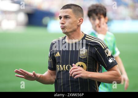 Seattle, États-Unis. 17 août 2024. Le défenseur du LAFC Sergi Palencia (14 ans) dit à un coéquipier de ralentir dans un match de la Coupe des ligues contre le Seattle Sounders FC au Lumen Field à Seattle, Washington, le 17 août 2024. (Crédit photo Nate Koppelman/Sipa USA) crédit : Sipa USA/Alamy Live News Banque D'Images