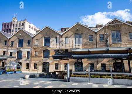 Sydney le quartier des Rocks de Campbells Cove et les anciens entrepôts coloniaux maintenant bureaux et restaurants, Circular Quay, Sydney, Australie Banque D'Images