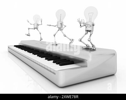 Figurines d'ampoules dansant sur un clavier électronique Banque D'Images