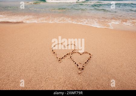 L'inscription je t'aime sur le bord de mer avec des palmiers Banque D'Images
