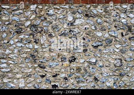 Silex et mur de pierre, extérieur du bâtiment. Banque D'Images