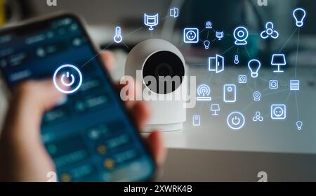 Réseau maillé des appareils domestiques intelligents. Télécommande pour smartphone Banque D'Images