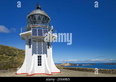 Phare de Cape Reinga à l'extrémité nord de l'île du Nord, Nouvelle-Zélande. Banque D'Images