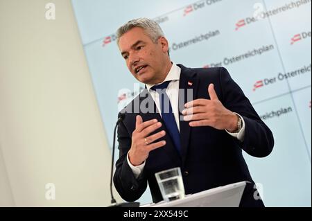 Vienne, Autriche. 22 août 2024. Conférence de presse du Parti populaire autrichien (ÖVP) sur le thème "présentation du nouveau modèle d'assistance sociale" avec le chancelier fédéral et président du Parti fédéral Karl Nehammer Banque D'Images