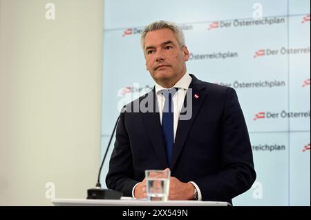 Vienne, Autriche. 22 août 2024. Conférence de presse du Parti populaire autrichien (ÖVP) sur le thème "présentation du nouveau modèle d'assistance sociale" avec le chancelier fédéral et président du Parti fédéral Karl Nehammer Banque D'Images