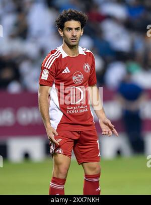 AL SADD SC vs Al ARABI SC -OOREDOO STARS LEAGUE QATAR Ahmed Alaaeildin Abdelmotaal de Al-Arabi SC en action lors du match de Ooredoo Stars League 24/25 entre Al-Sadd SC et Al-Arabi SC au stade Jassim Bin Hamad à Doha, Qatar, le 22 août 2024. DOHA Qatar Copyright : xNOUSHADx Banque D'Images