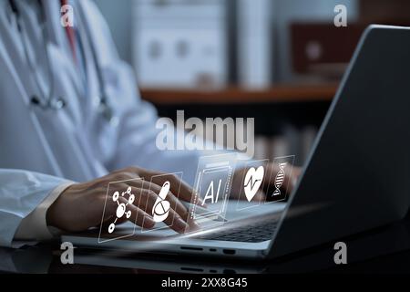 Un médecin est assis devant un ordinateur portable, avec un hologramme d'icônes apparaissant au-dessus du clavier. Au centre de l'hologramme se trouve une intelligence artificielle Banque D'Images