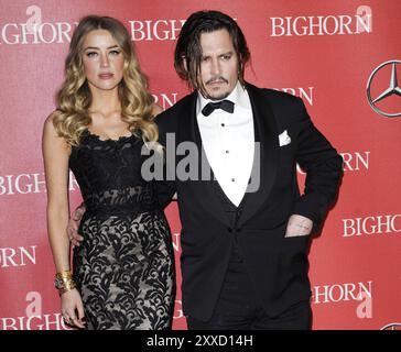 Amber Heard et Johnny Depp lors du 27e Gala annuel des prix du Festival international du film de Palm Springs qui s'est tenu au Palm Springs Convention Center à Palm Banque D'Images