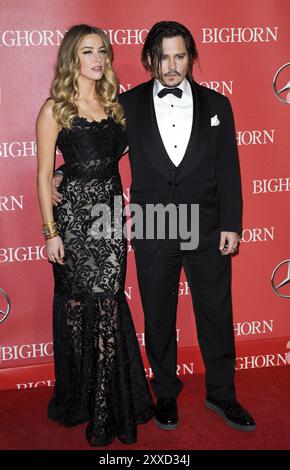 Amber Heard et Johnny Depp lors du 27e Gala annuel des prix du Festival international du film de Palm Springs qui s'est tenu au Palm Springs Convention Center à Palm Banque D'Images