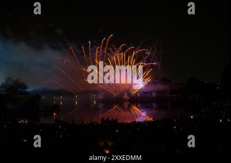 Muenchen, Sommerfestival Olympiapark 2024 , grosses Feuerwerk ueber und im Olympiasee *** Munich, Summer Festival Olympiapark 2024 , big fireworks display over and in the Olympic Lake Stock Photo