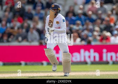 Old Trafford, Manchester on Saturday 24th August 2024. Dinesh Chandimal #56 of Sri Lanka makes a run during the 1st Rothesay Test match between England and Sri Lanka at Emirates Old Trafford, Manchester on Saturday 24th August 2024. (Photo: Mike Morese | MI News) Credit: MI News & Sport /Alamy Live News Stock Photo