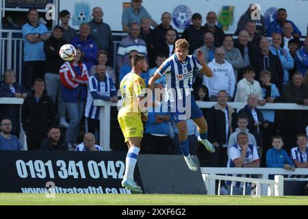 Victoria Park, Hartlepool on Saturday 24th August 2024. Hartlepool United's Louis Stephenson challenges for a header with Wealdstone's Anthony Georgiou during the Vanarama National League match between Hartlepool United and Wealdstone at Victoria Park, Hartlepool on Saturday 24th August 2024. (Photo: Mark Fletcher | MI News) Credit: MI News & Sport /Alamy Live News Stock Photo