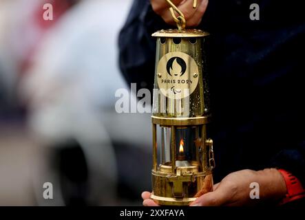 Stoke Mandeville, Britain. 24th Aug, 2024. Flame lantern is seen during the Paralympic Torch-Lighting Ceremony for the Paris 2024 Paralympic Games at Stoke Mandeville, Britain, on August 24, 2024. Credit: Li Ying/Xinhua/Alamy Live News Stock Photo