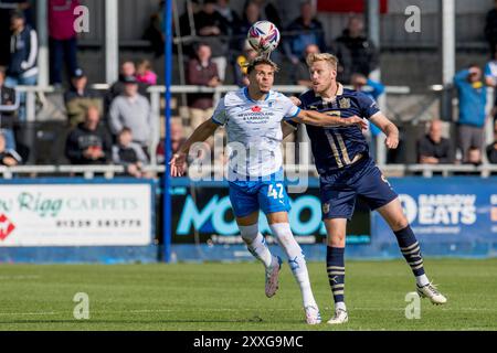 Holker Street, Barrow-in-Furness le samedi 24 août 2024. Theo Vassell de Barrow en action avec Ryan Croasdale de Port Vale lors du match de Sky Bet League 2 entre Barrow et Port Vale au Holker Street, Barrow-in-Furness le samedi 24 août 2024. (Photo : Ian Allington | mi News) crédit : MI News & Sport /Alamy Live News Banque D'Images