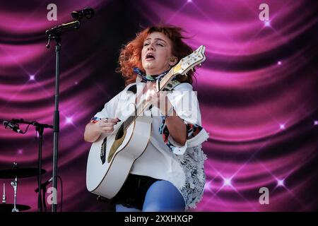 Southsea, UK. 24th Aug, 2024. Irish singer, songwriter, and musician Ciara Mary-Alice Thompson, known professionally as CMAT, performs live on stage at Victorious Festival. Credit: SOPA Images Limited/Alamy Live News Stock Photo