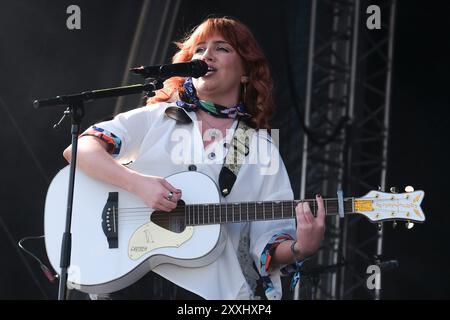 Southsea, UK. 24th Aug, 2024. Irish singer, songwriter, and musician Ciara Mary-Alice Thompson, known professionally as CMAT, performs live on stage at Victorious Festival. Credit: SOPA Images Limited/Alamy Live News Stock Photo