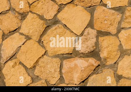 Texture de vieux mur de briques en pierre dans la ville Banque D'Images