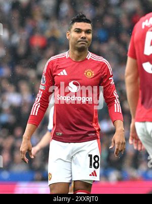 Casemiro de Manchester United pendant le match de premier League entre Brighton et Hove Albion et Manchester United au stade American Express , Brighton , Royaume-Uni - 24 août 2024 photo Simon Dack / images téléphoto usage éditorial seulement. Pas de merchandising. Pour Football images, les restrictions FA et premier League s'appliquent inc. aucune utilisation d'Internet/mobile sans licence FAPL - pour plus de détails, contactez Football Dataco Banque D'Images