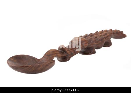 Cuillère en bois sculptée en forme de crocodile Banque D'Images