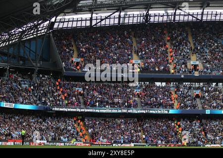 Les fans d'Ipswich Town Inside the Etihad Stadium - Manchester City v Ipswich Town, premier League, Etihad Stadium, Manchester, UK - 24 août 2024 usage éditorial exclusif - des restrictions DataCo s'appliquent Banque D'Images