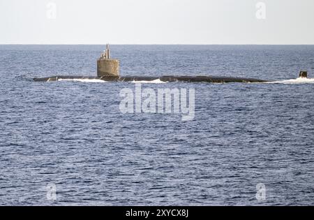 Honolulu, États-Unis. 31 juillet 2024. Un sous-marin navigue près du port naval de Pearl Harbor pendant la rive du Pacifique (RIMPAC, 26.06.) Exercice militaire mené par les États-Unis. Crédit : Soeren Stache/dpa/Alamy Live News Banque D'Images