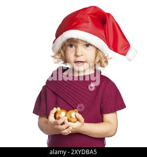 Fille heureuse dans le chapeau de Père Noël tenant des décorations de Noël dans la main isolé sur fond blanc Banque D'Images