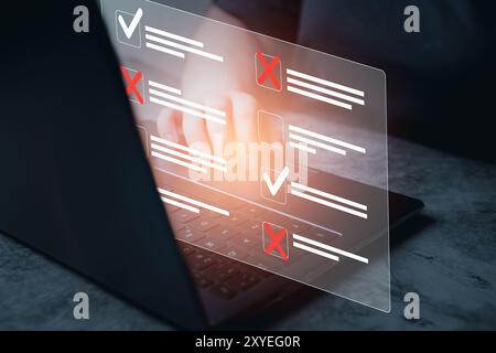 Certification d'approbation des documents et concept de liste de contrôle. La femme utilise un ordinateur portable avec une liste de contrôle holographique avec des projets approuvés et rejetés. Concept de surveillance des performances de l'entreprise. Banque D'Images